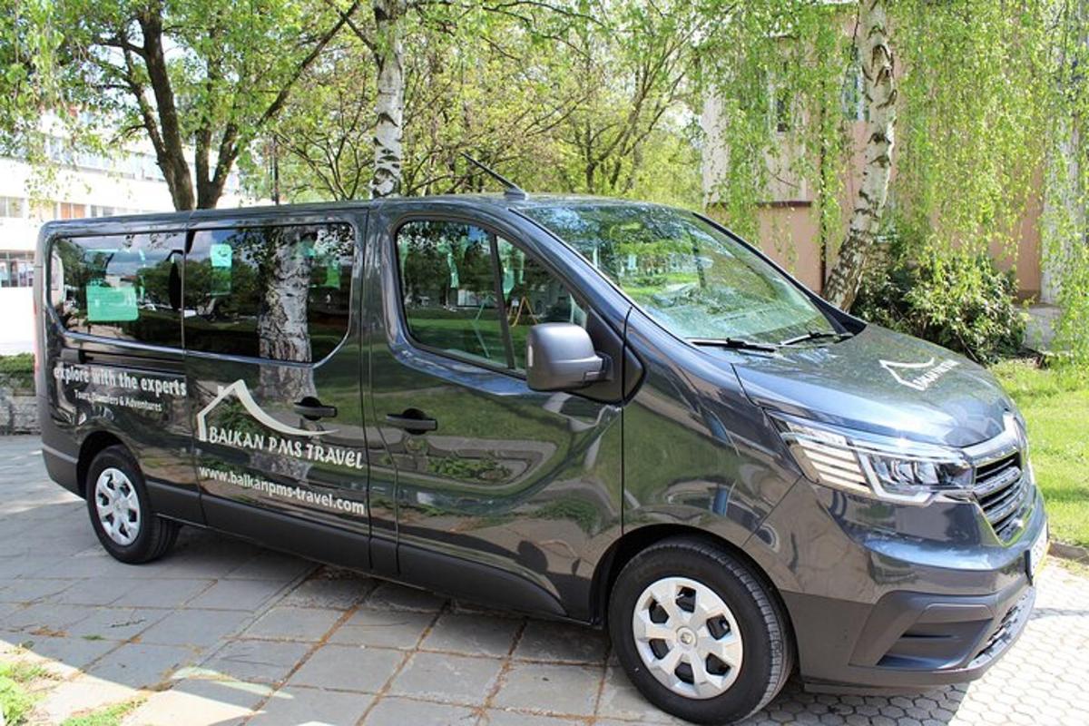 a black van parked on the side of a street