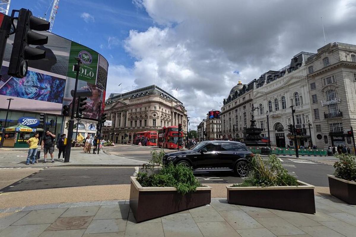 a car driving down a city street with buildings
