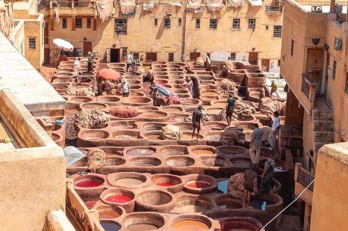 a group of pots are lined up on a street