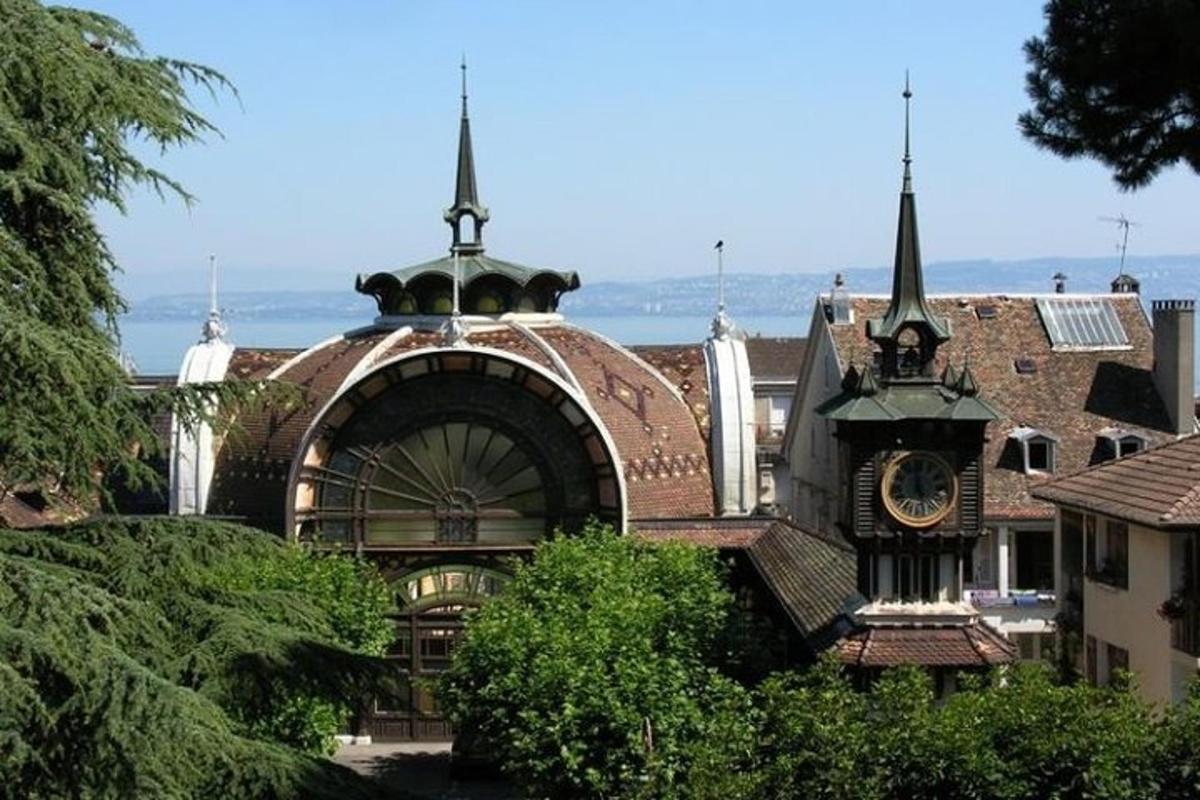 a building with a clock tower on the side of it