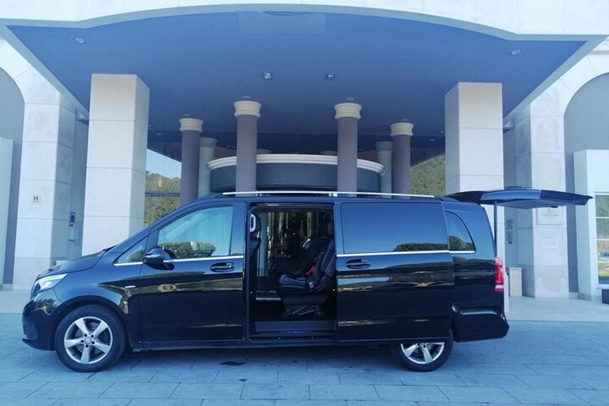 a black van parked in front of a building