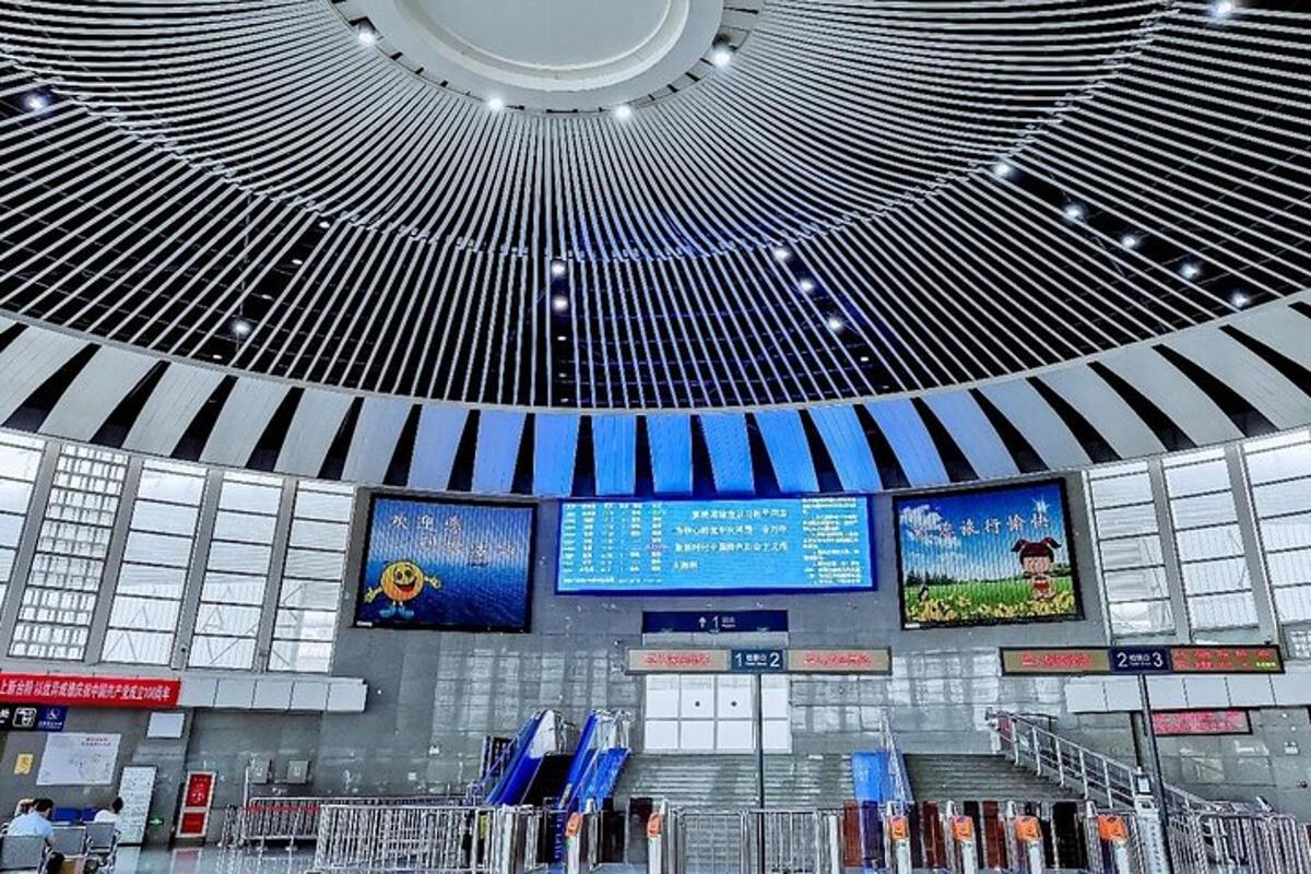 a large building with a domed ceiling with screens