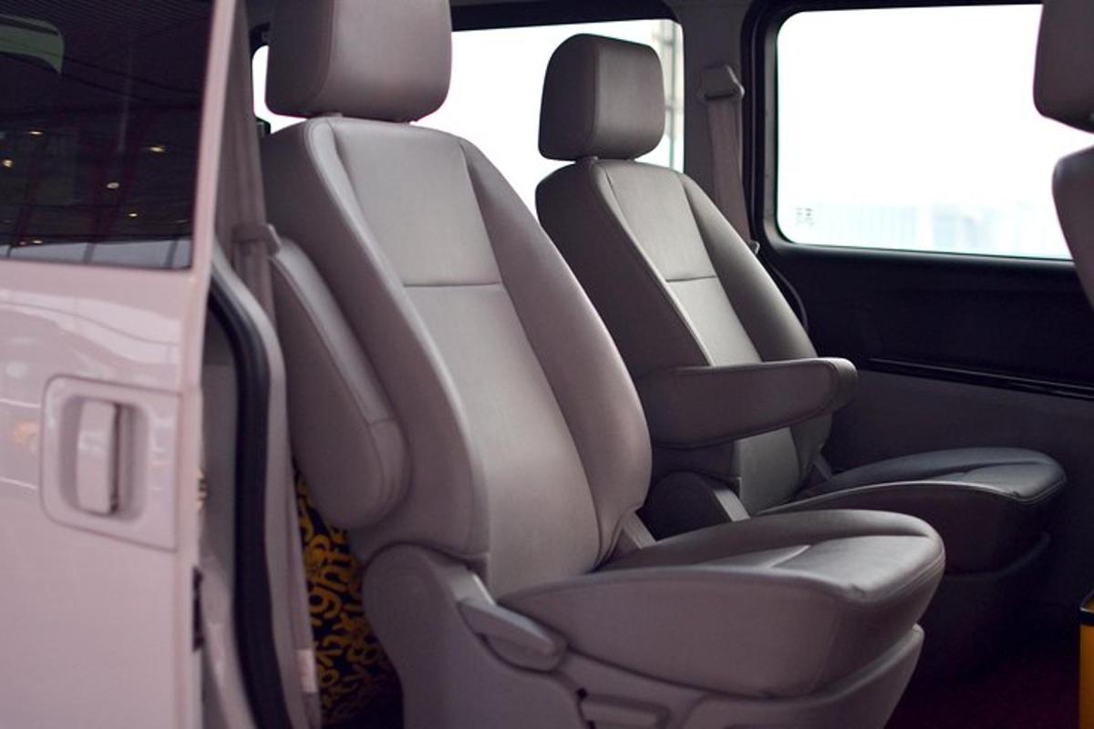 two rows of seats in the back of a vehicle