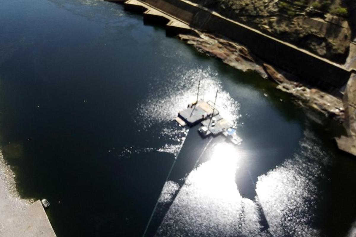 an aerial view of a boat in the water