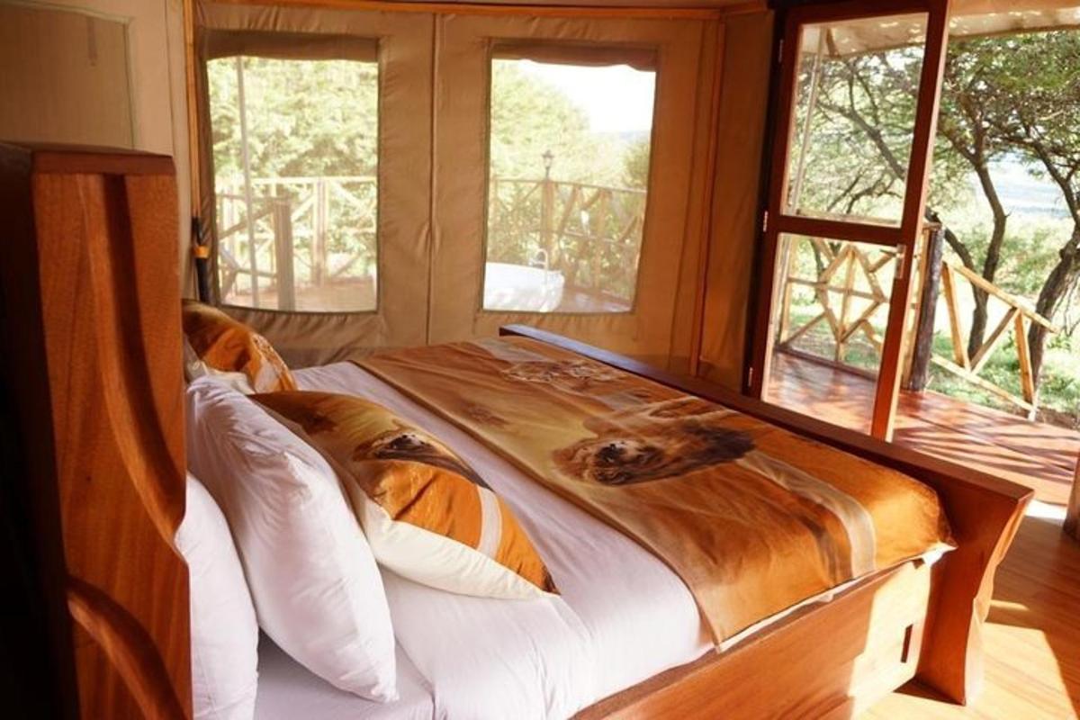a bed in a room with two windows and a bed sidx sidx sidx