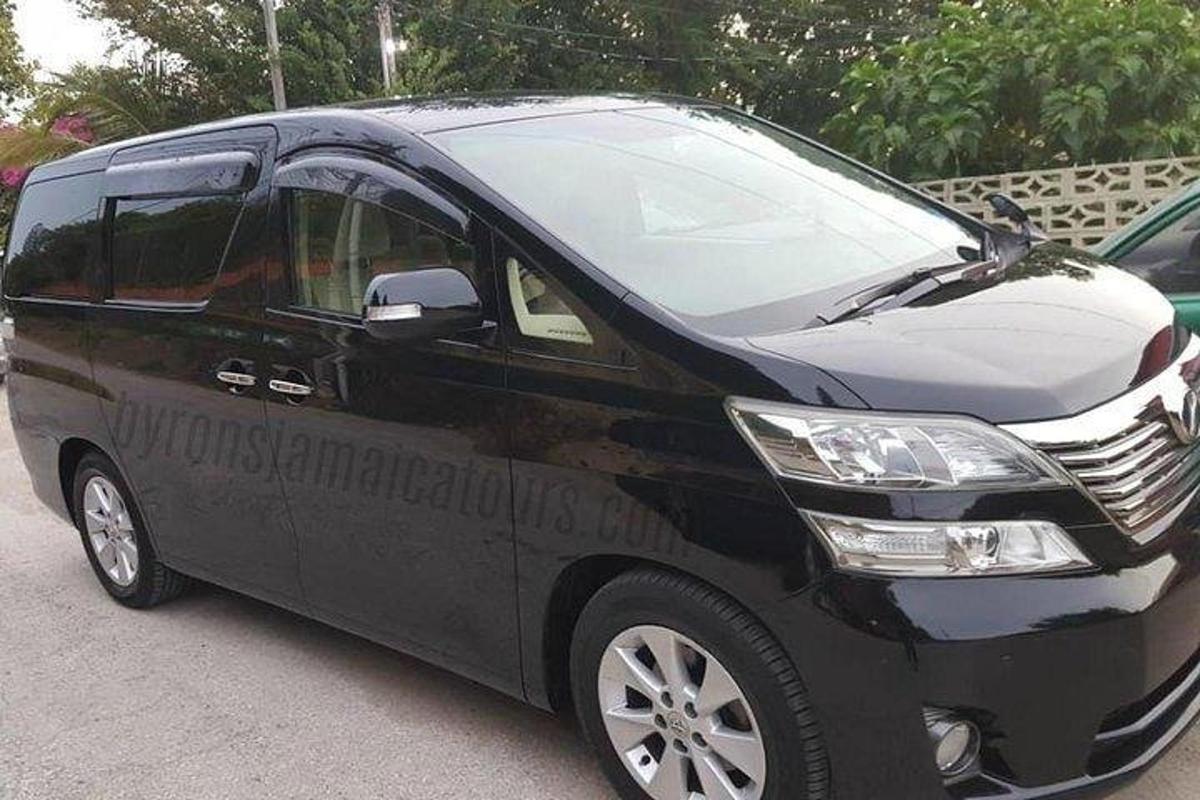 a black van parked in a parking lot