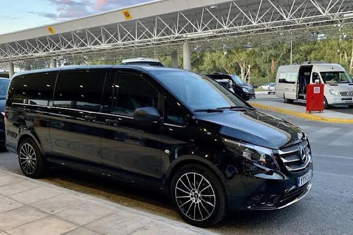 a black suv parked in a parking lot