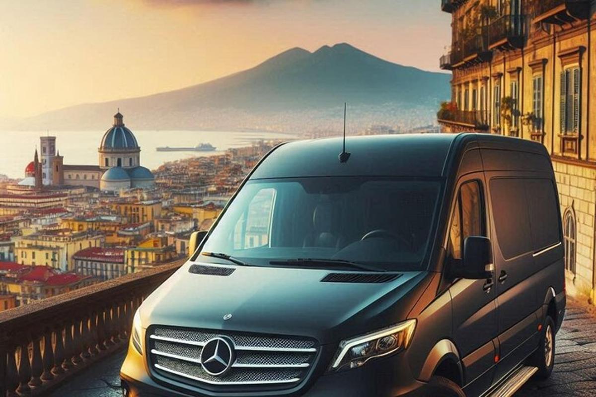 a van parked on a street with a view of a city