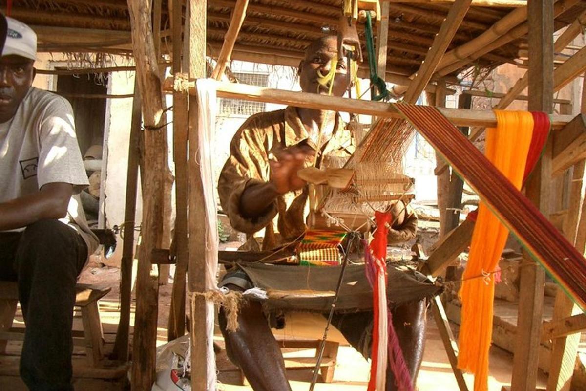 two men are working on a wooden object