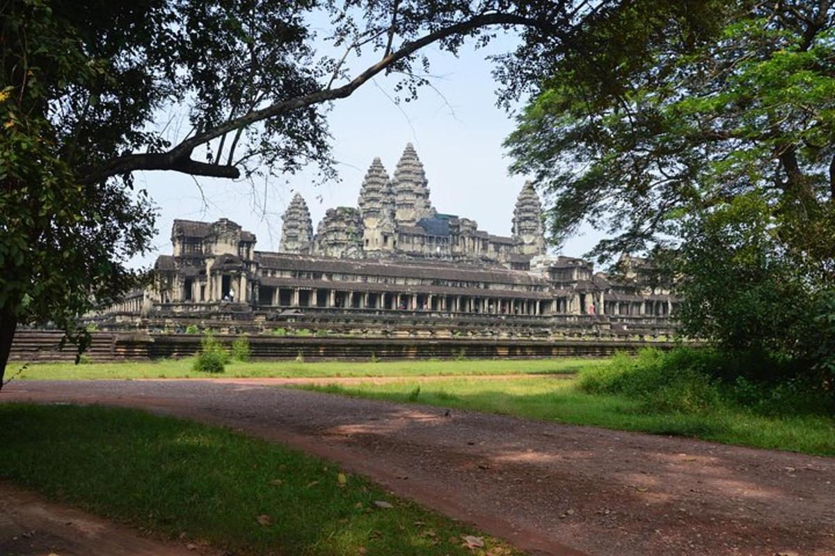 a view of a large building in a park