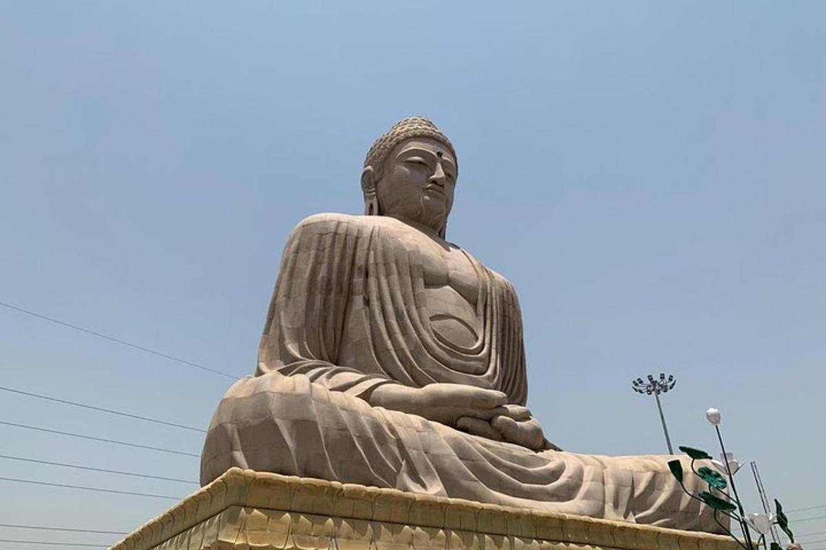 a large statue sitting on top of a building