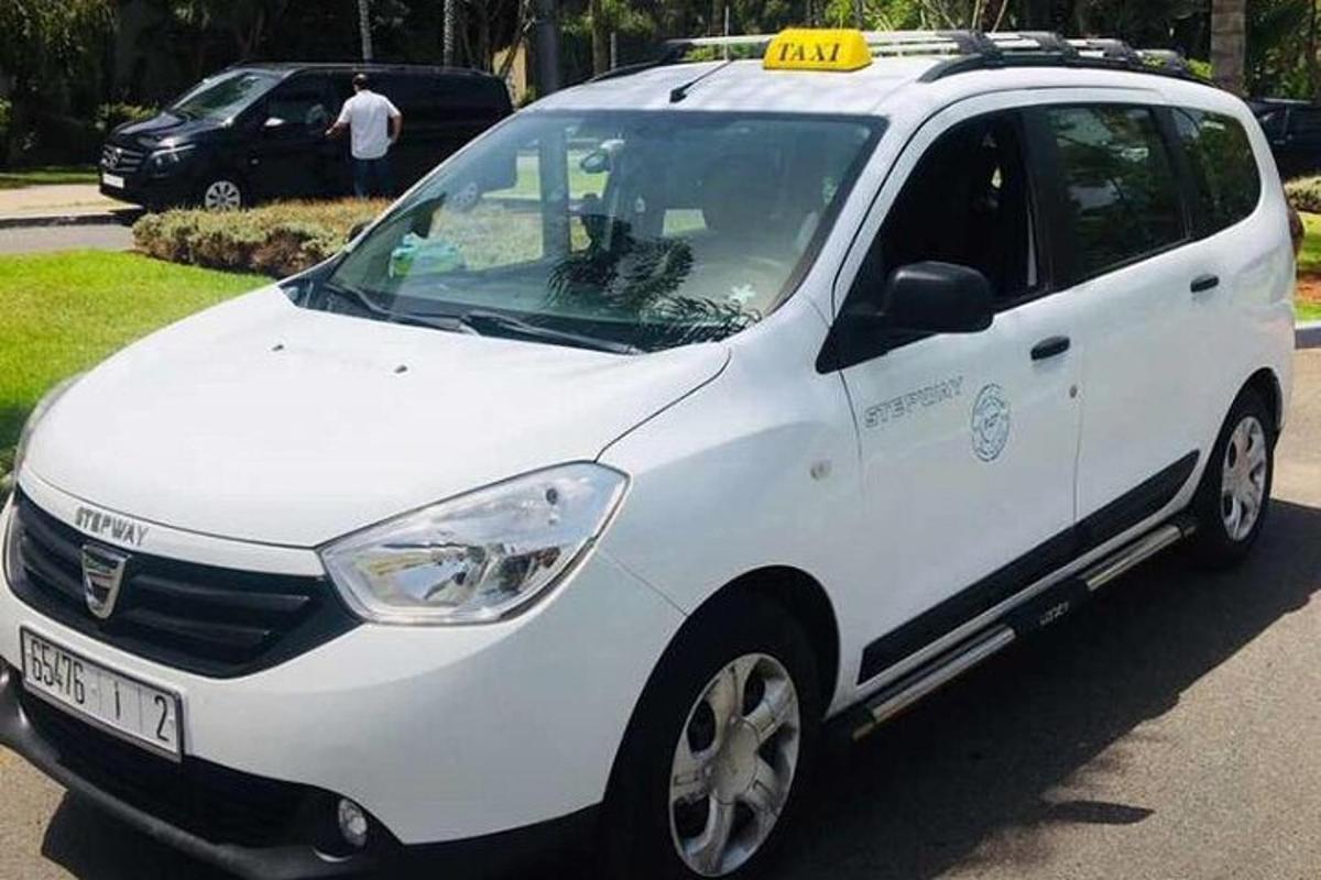 a white car parked in a parking lot