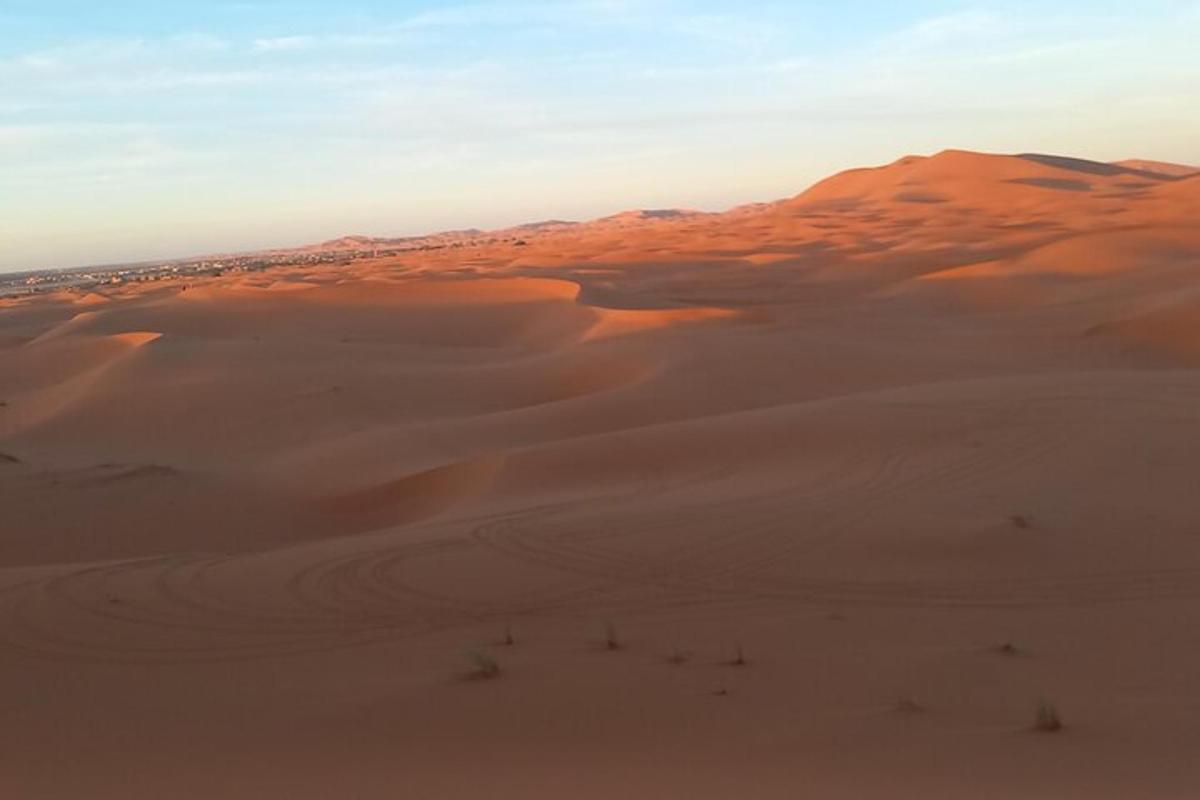 an aerial view of sand dunes in the desert