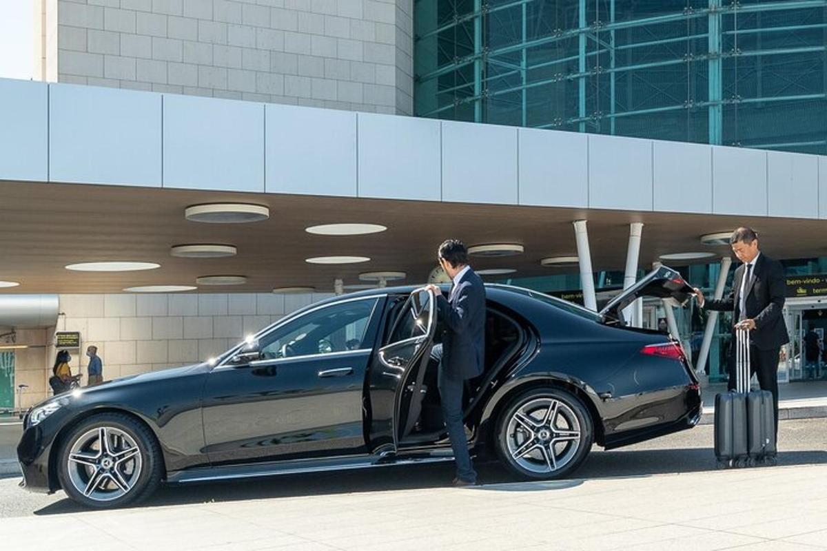 a couple of people getting into a car