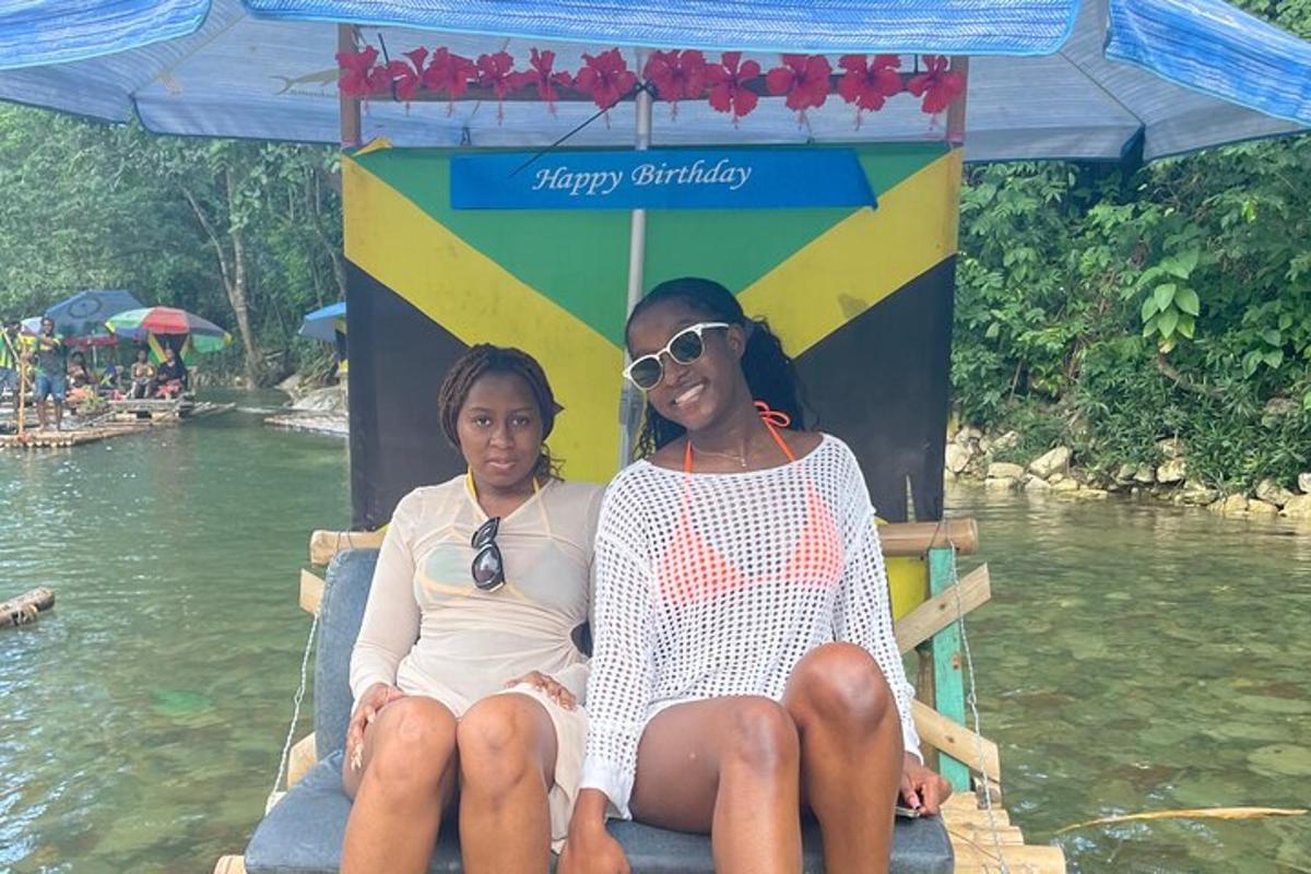 two women sitting on a raft in the water