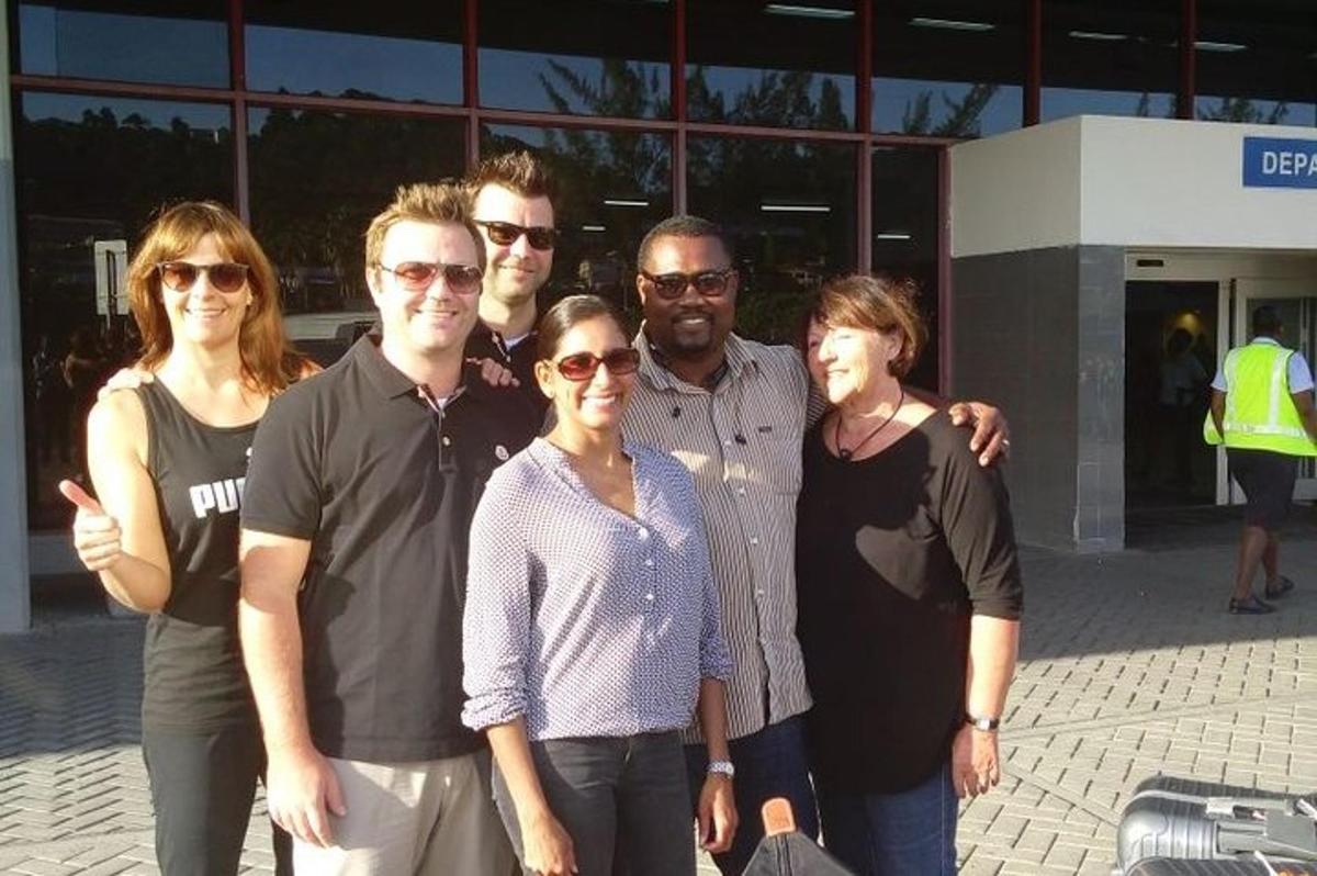 a group of people standing in front of a building