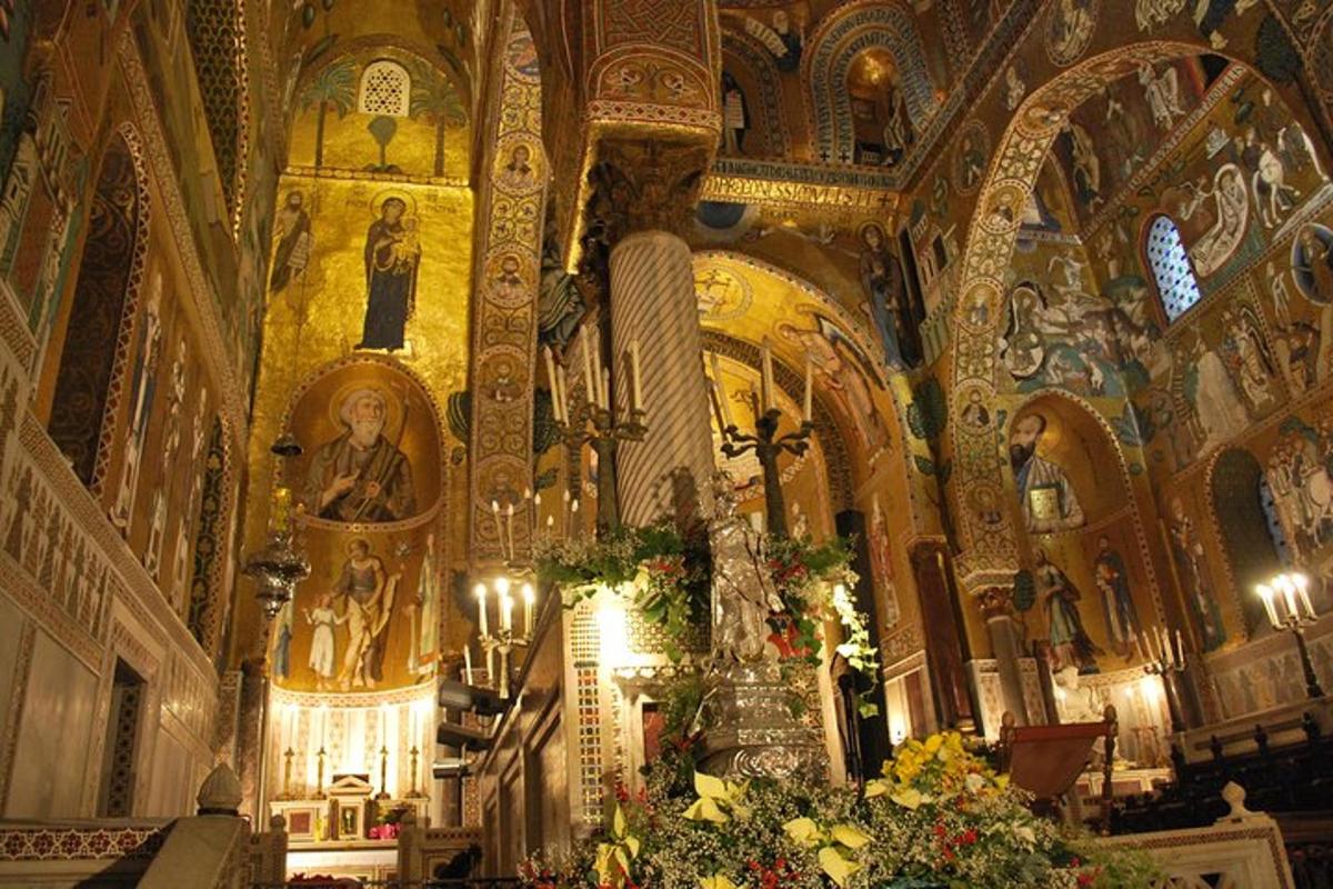a church with a altar with flowers in it