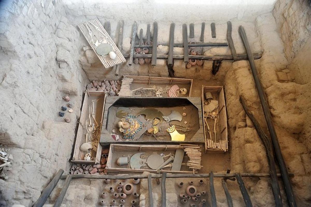 an overhead view of a stone wall with dishes and utensils