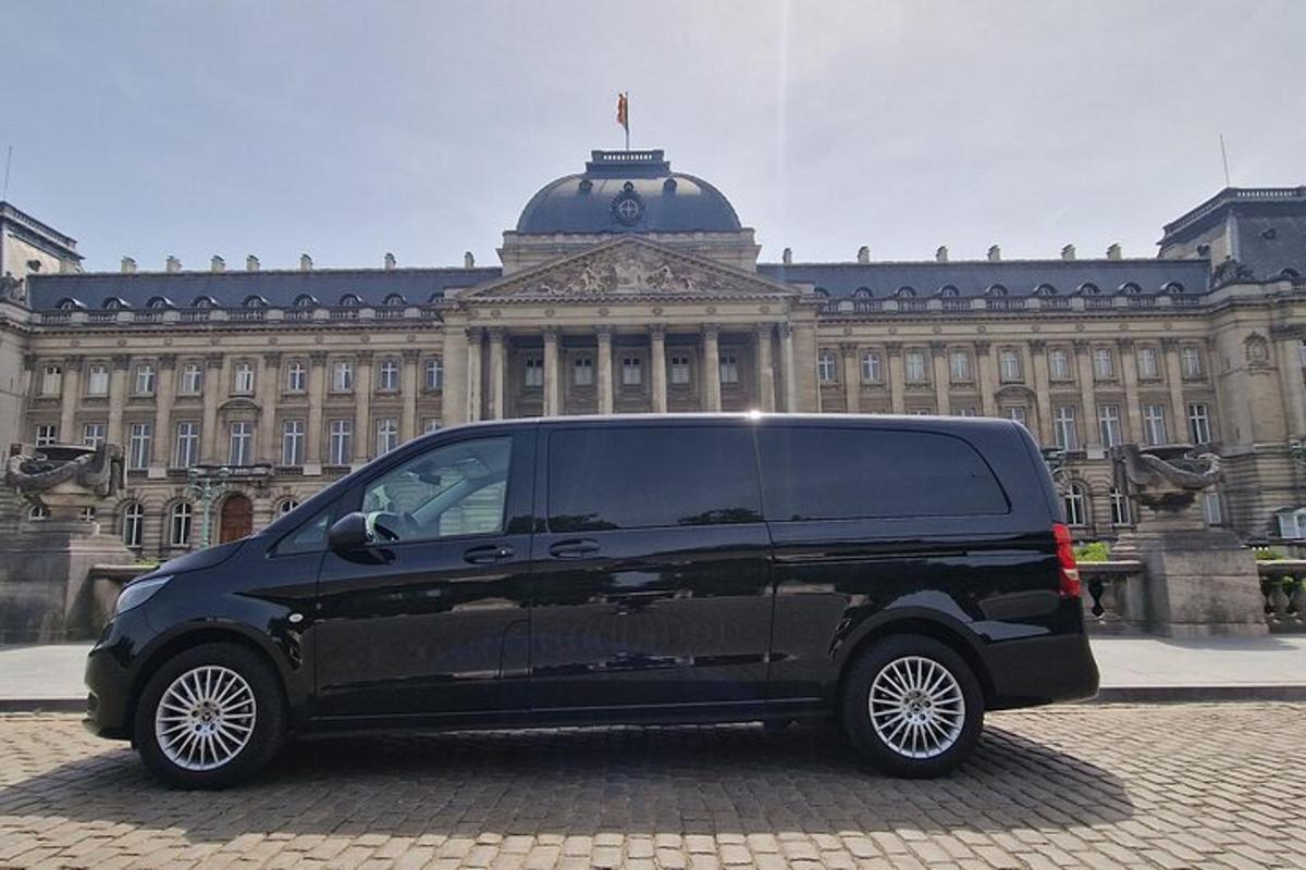 a black van parked in front of a building