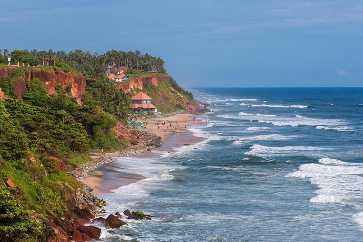 a view of the ocean with people on the beach
