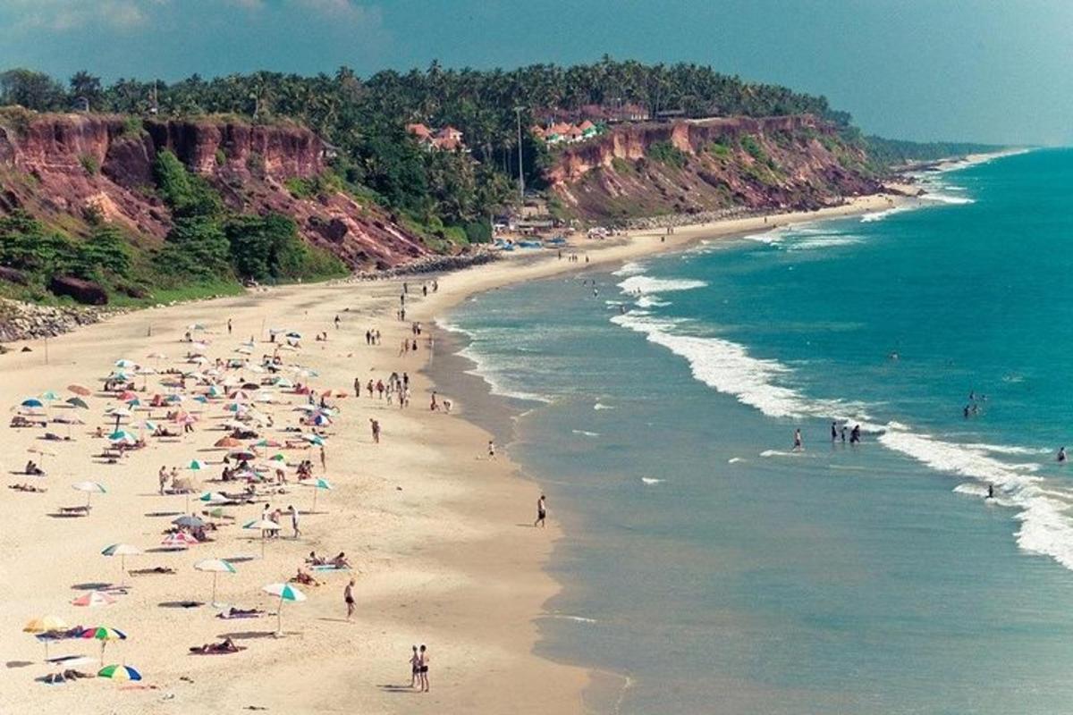 a group of people on a beach near the ocean