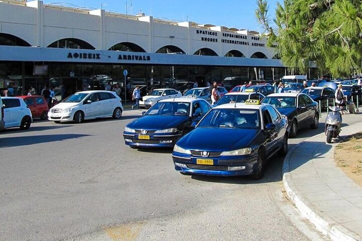 a bunch of cars parked in a parking lot