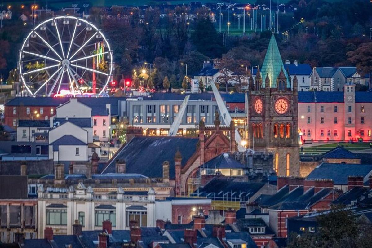 a city with a clock tower and a ferris wheel
