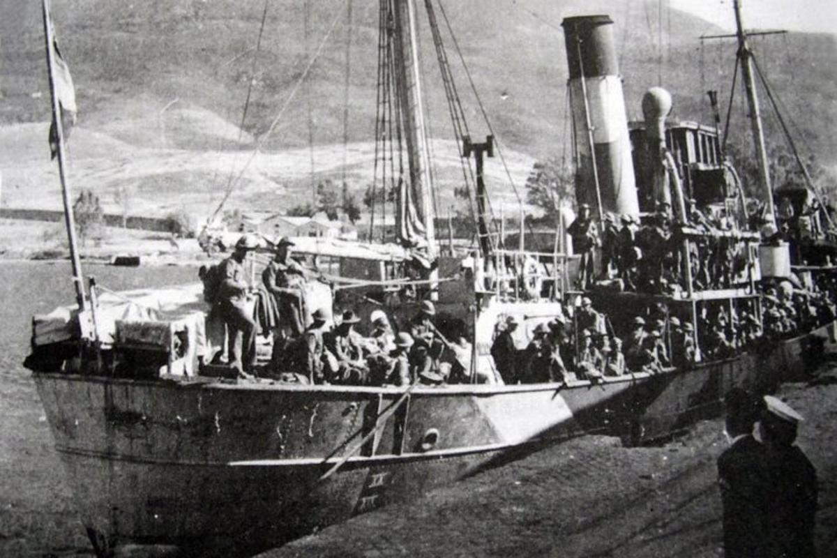 an old photo of a group of people on a boat