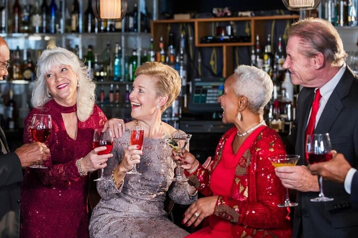 a group of people drinking wine in a bar