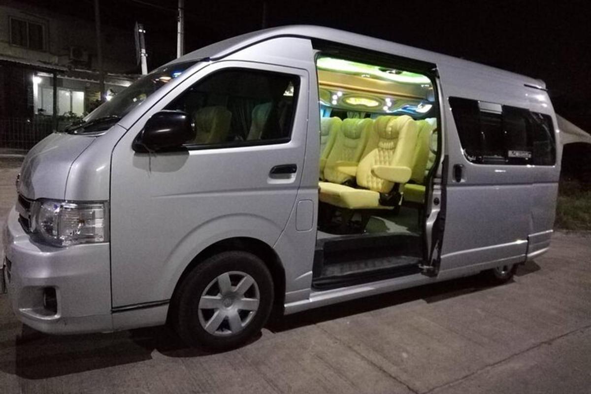 a white van with the door open on a street