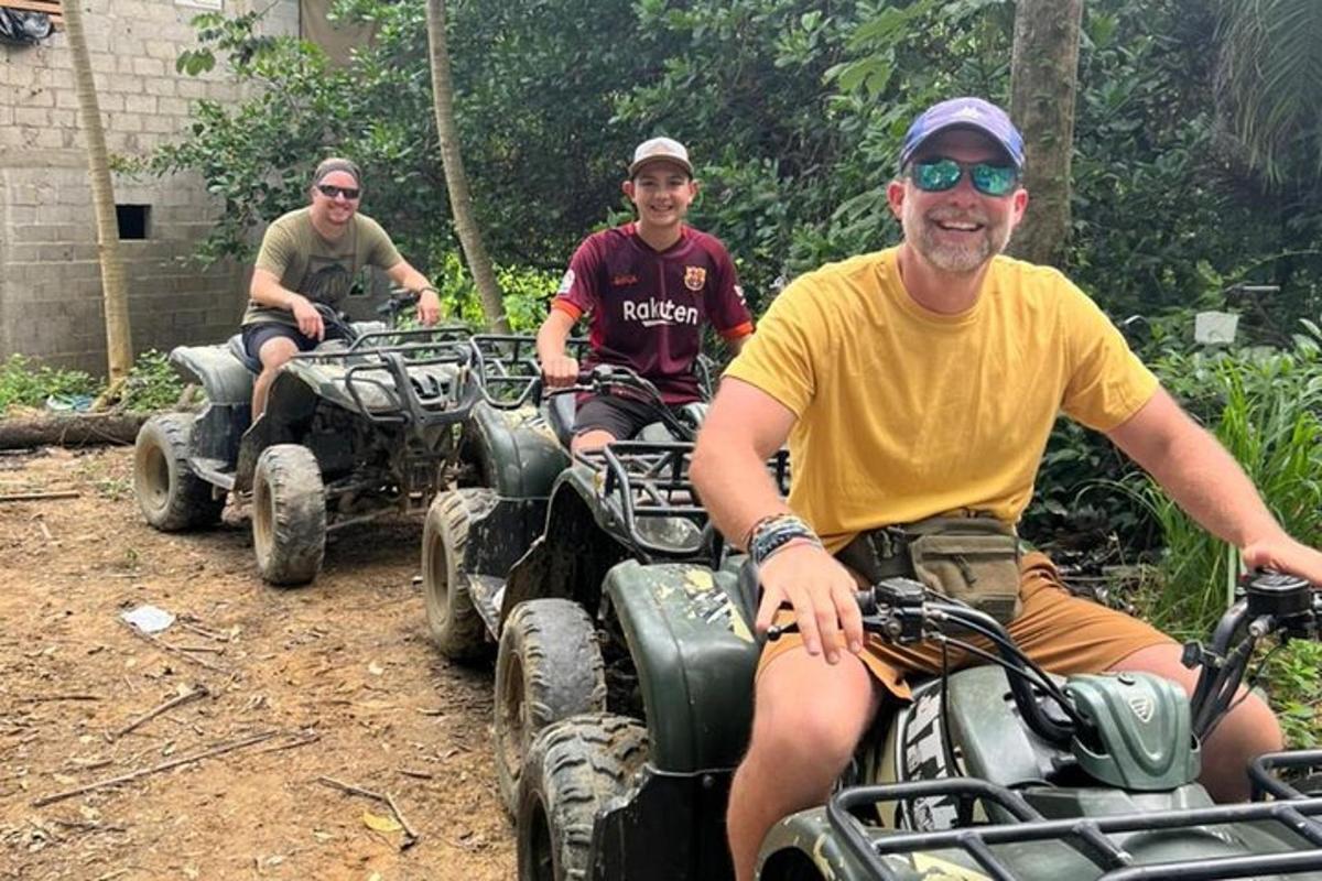 a group of men sitting on four wheeler atvs