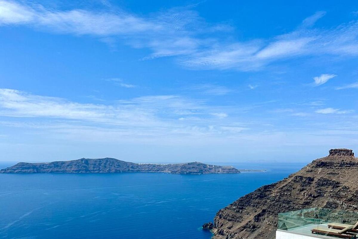 a view of a large body of water with mountains