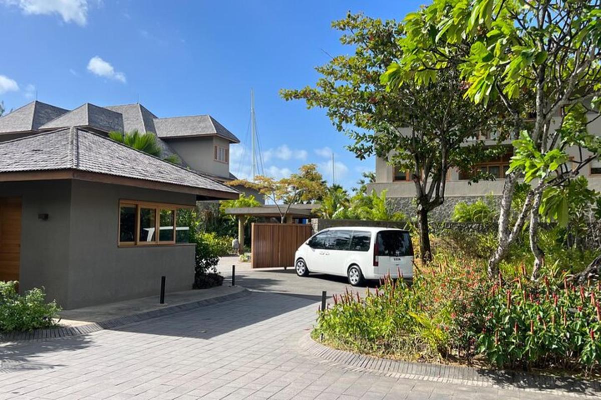 a white van parked in front of a house