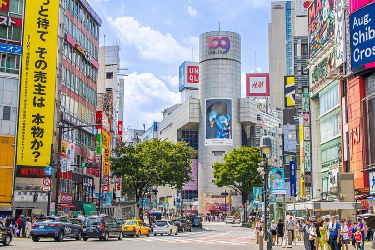 a busy street in a city with cars and buildings