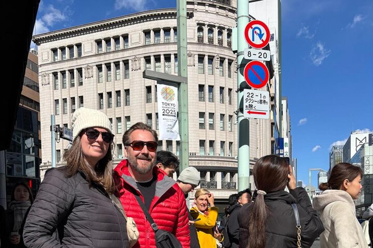 a man and a woman standing on a city street