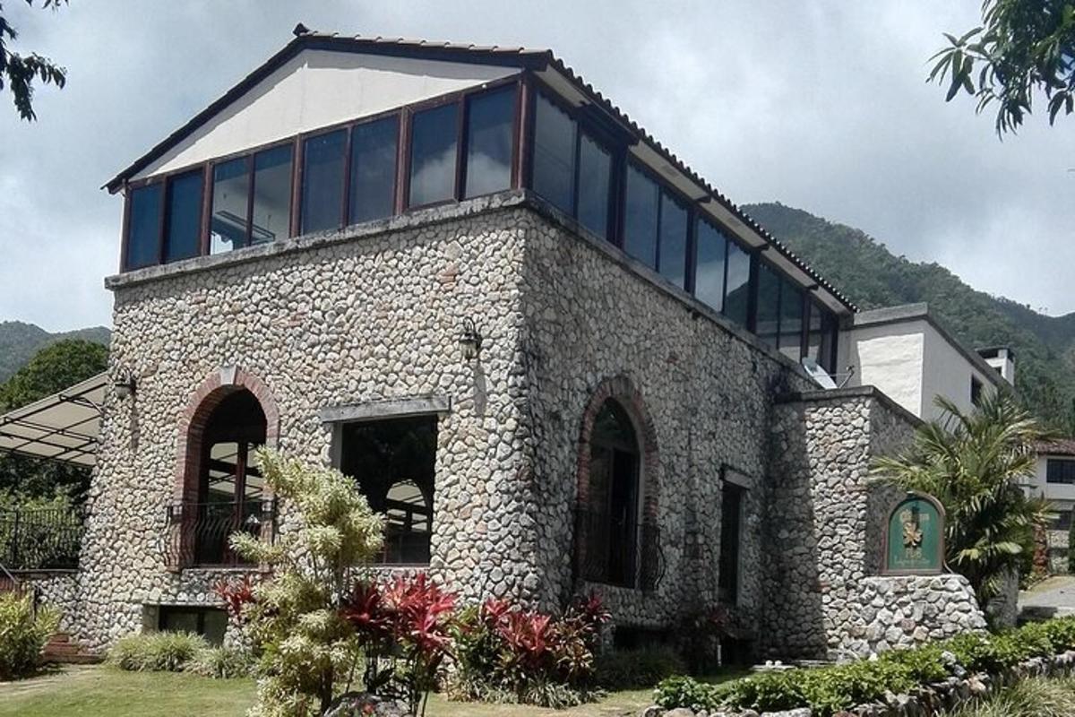 a large stone house with a lot of windows