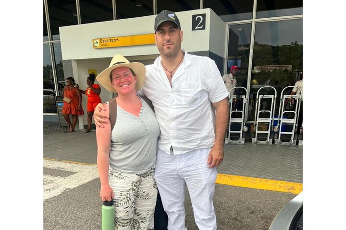 a man and a woman posing for a picture