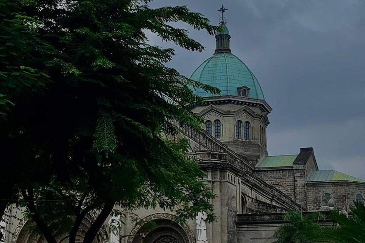 a building with a green dome on top of it