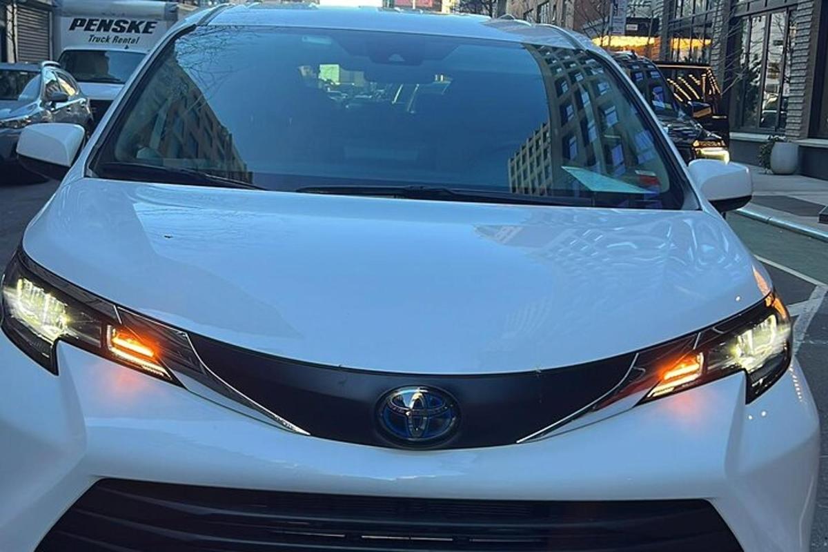 a white car parked in a parking lot