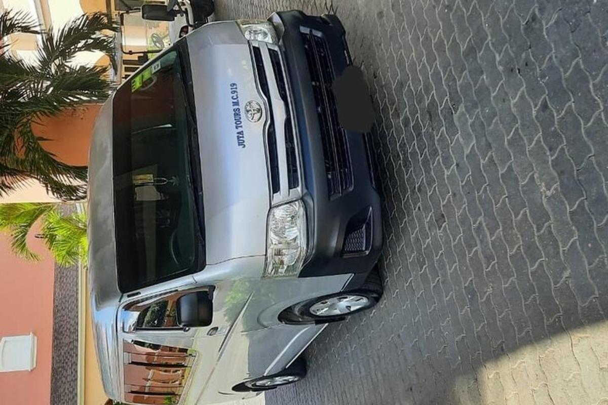 a car parked on the street with its hood open