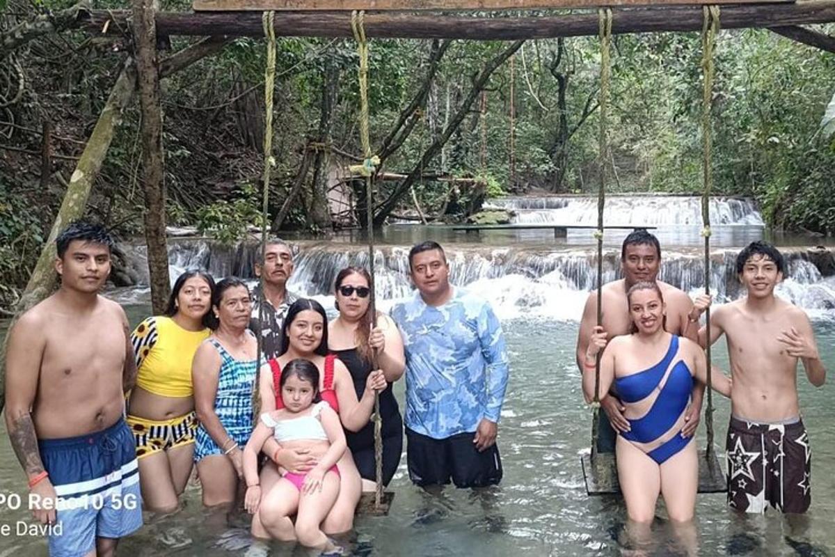a group of people standing in the water