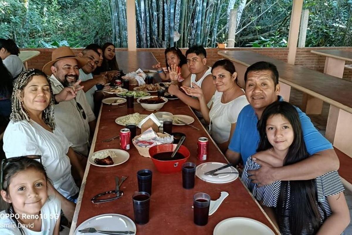 a group of people sitting around a table eating