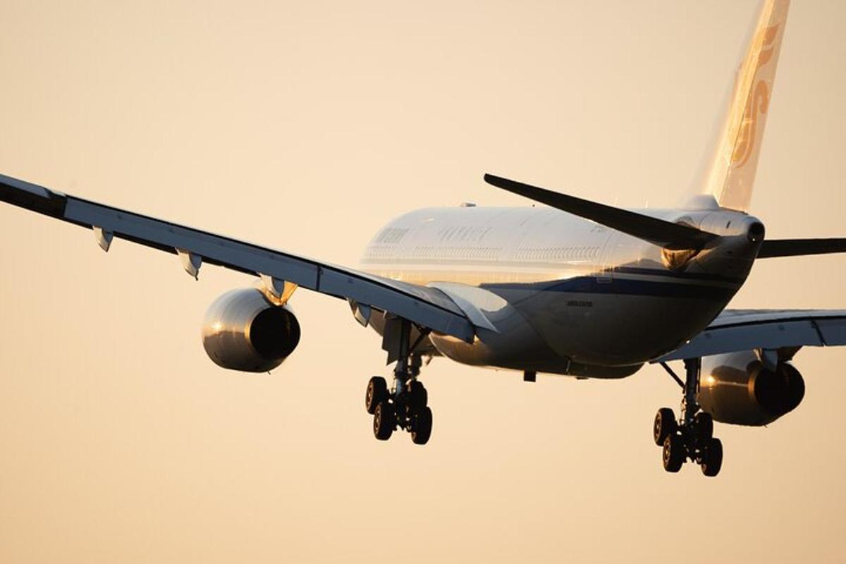 an airplane is flying in the sky