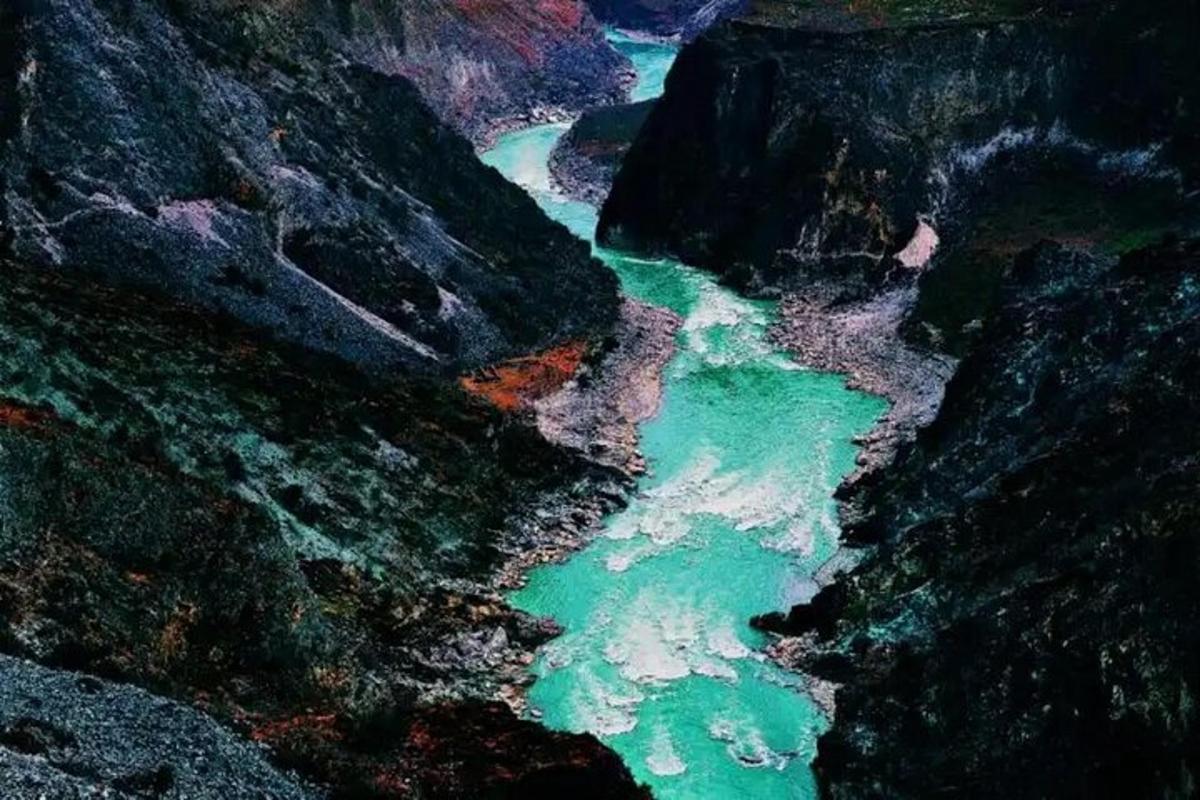 an aerial view of a river in a canyon