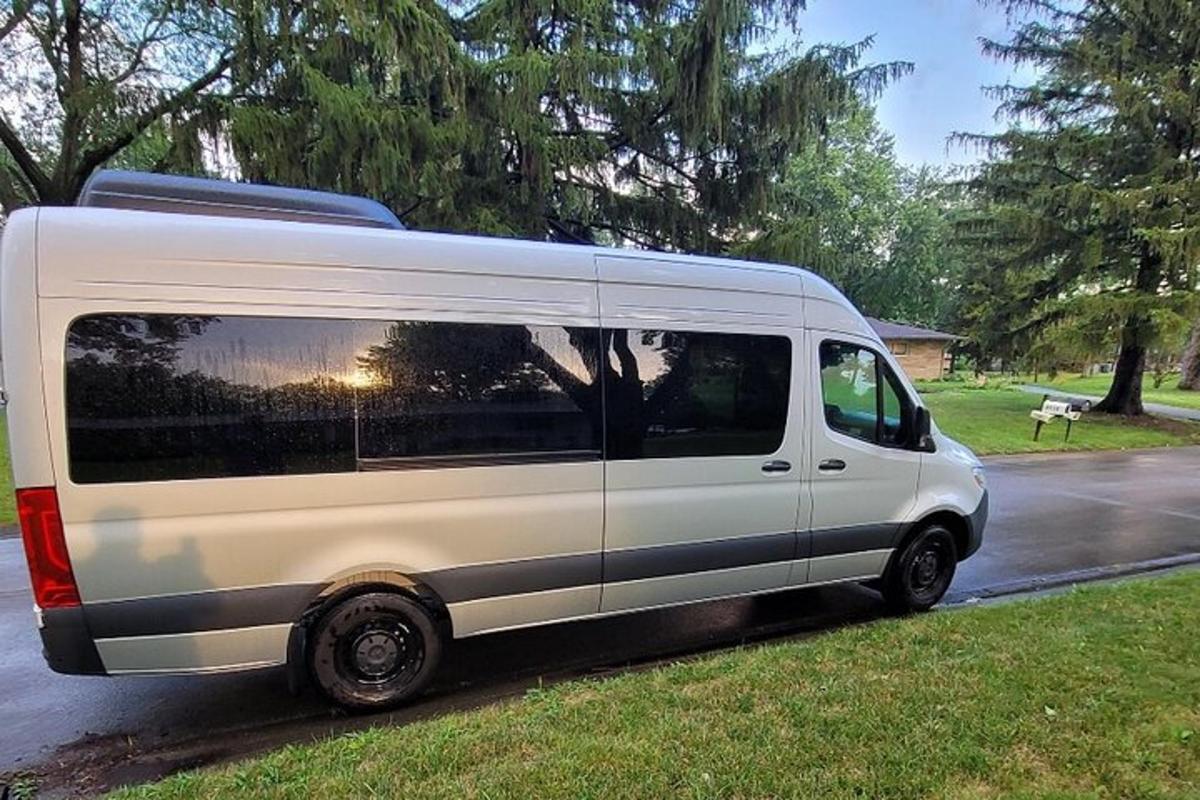 a white van parked on the side of a street