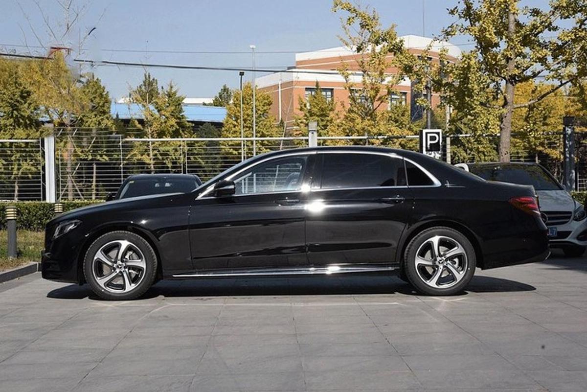 a black car parked in a parking lot