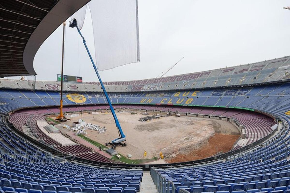 a construction crew is working in a stadium