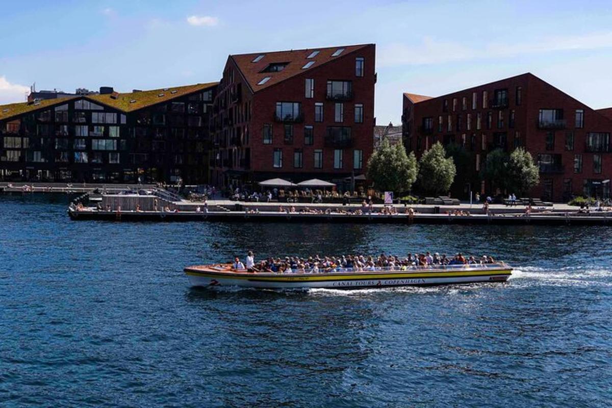 a group of people on a boat in the water
