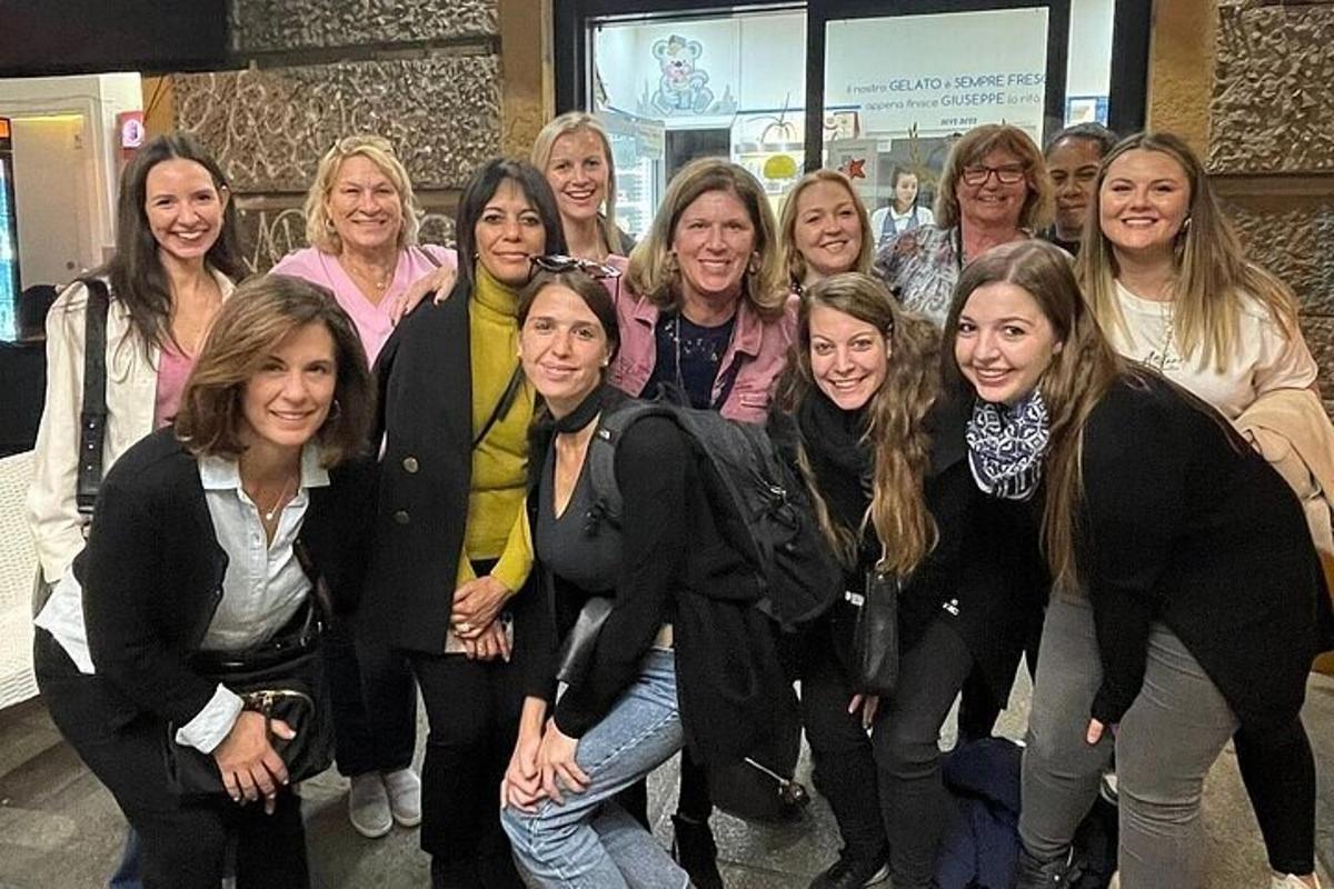 a group of women posing for a picture