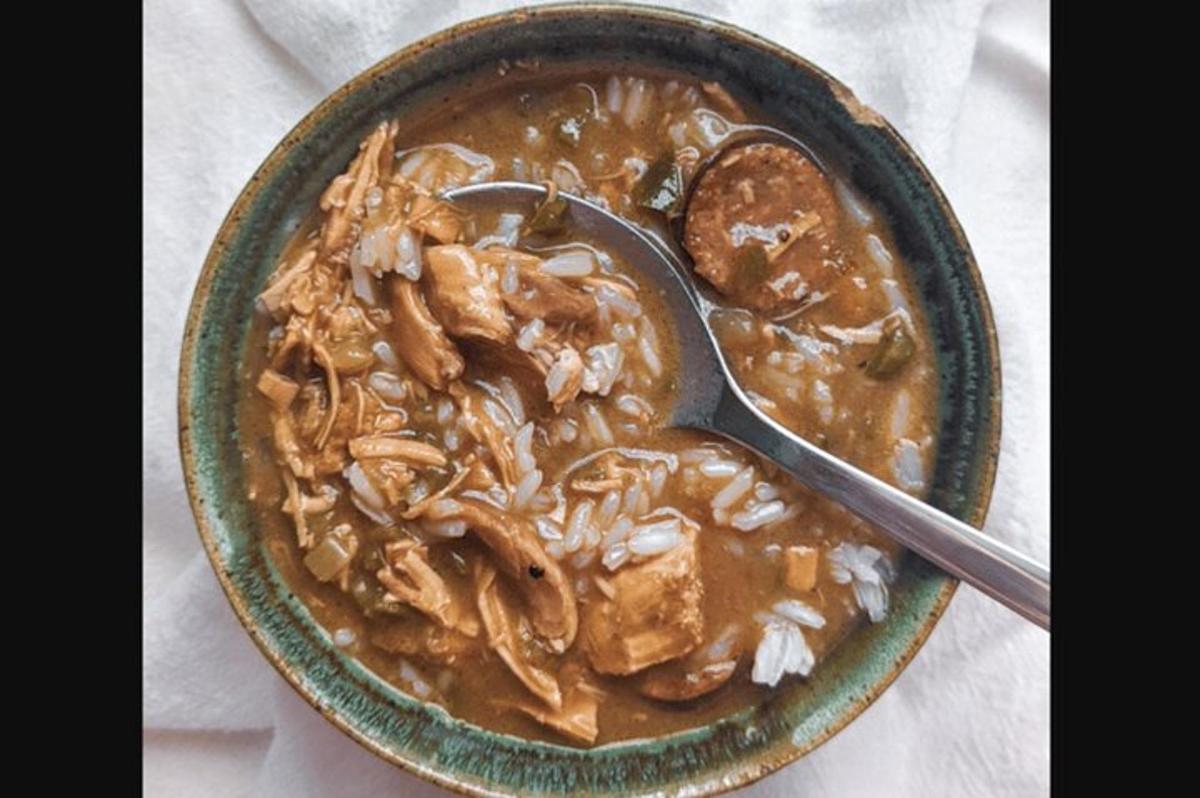 a bowl of soup with a spoon in it